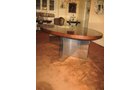 Dunbar Dining or Conference Table Mid to late 70s Designed by Roger Lee Sprunger, a protege of Edward Wormley An iconic piece wth high mirrored pristine finish of Brazilian Rosewood with Mahogany banned edges.  Polished Chrome Planks â€“ Plinths V shaped bases and middle secret drawer with Brass Dunbar tag.  Oval in shape and measuring 110 in. x 60 in.     - Extraordinary Auction - Nike Spillson Home Interiors & Furnishings